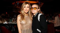 Chrishell Stause (left) and G Flip attend Drake's Hollywood grand opening on May 4, 2023.