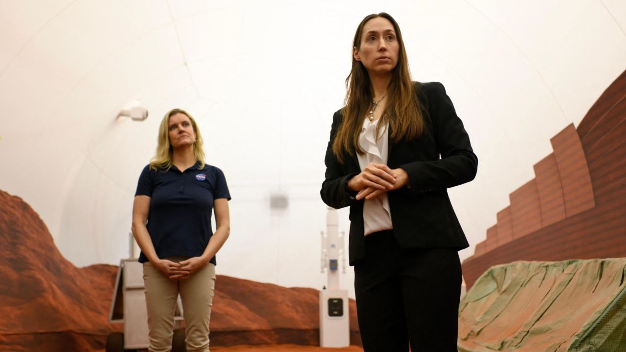 Dr. Suzanne Bell, lead for NASA's Behavioral Health and Performance Laboratory, and Dr. Grace Douglas, CHAPEA principal investigator, at the unveiling of the habitat to press on April 11, 2023.