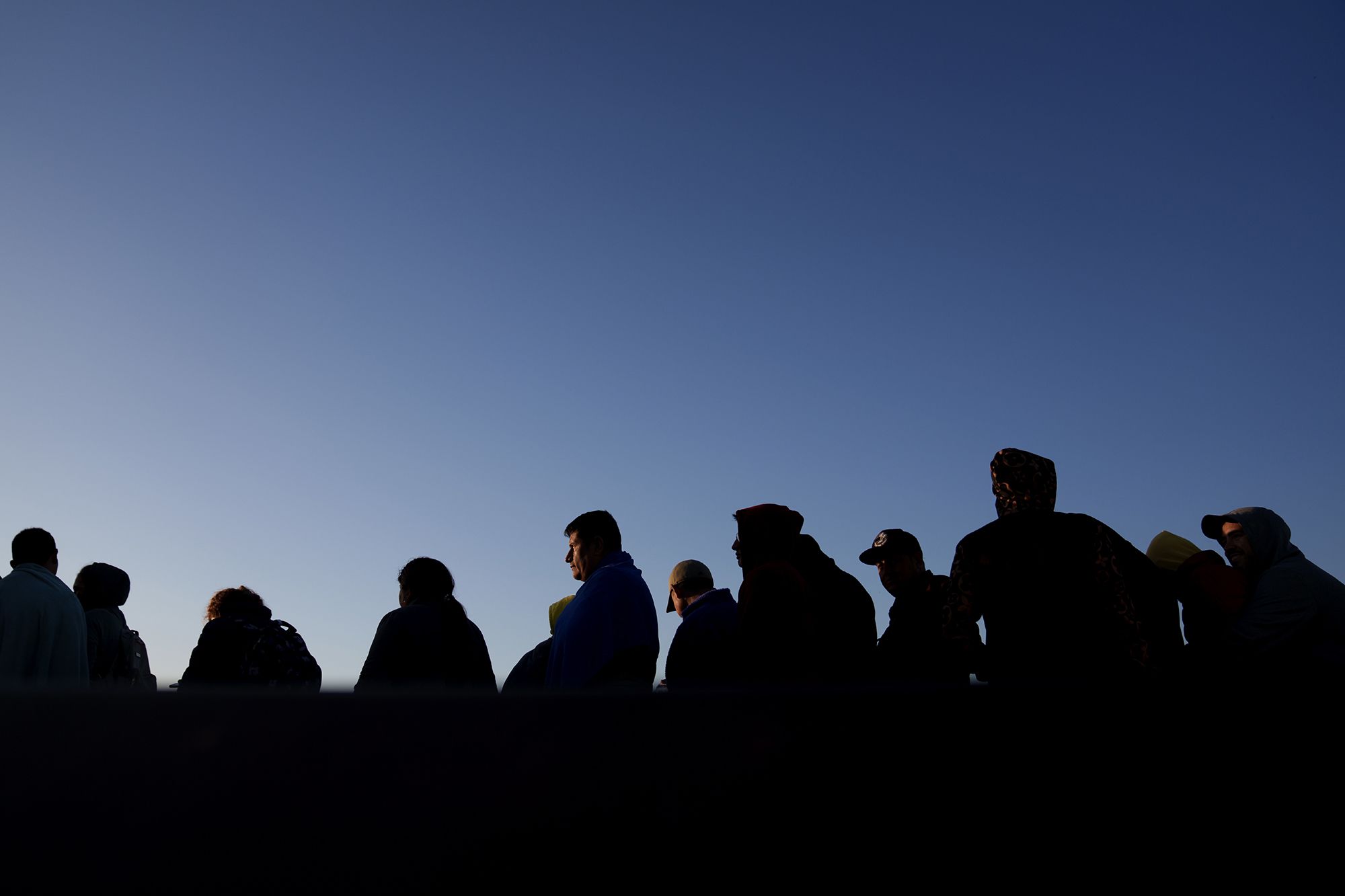 Migrants surrender to the US Border Patrol in Yuma on May 11.