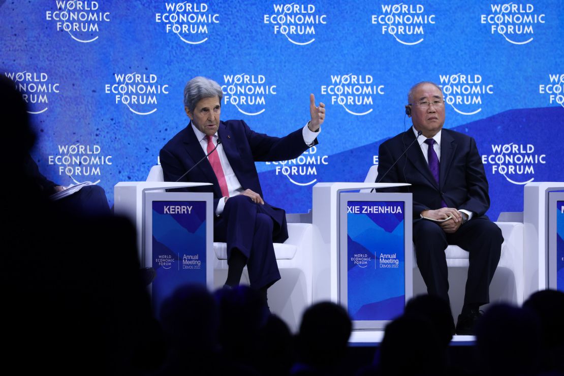 Kerry and Xie Zhenhua, left, China's special envoy for climate change, during a panel discussion at the World Economic Forum in Davos in 2022.