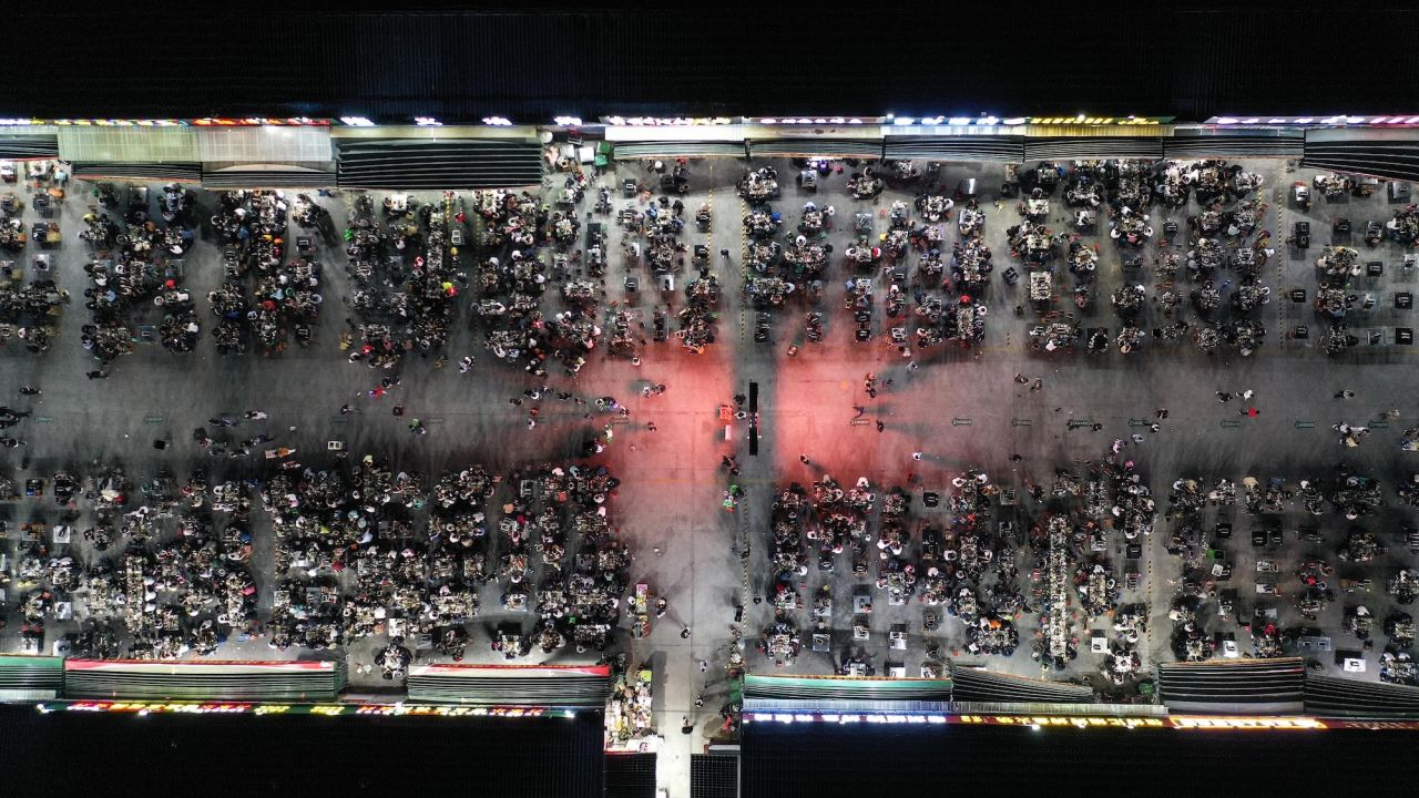 This aerial photo taken on May 8, 2023 shows people enjoying Zibo-style barbecue cuisine in the city.