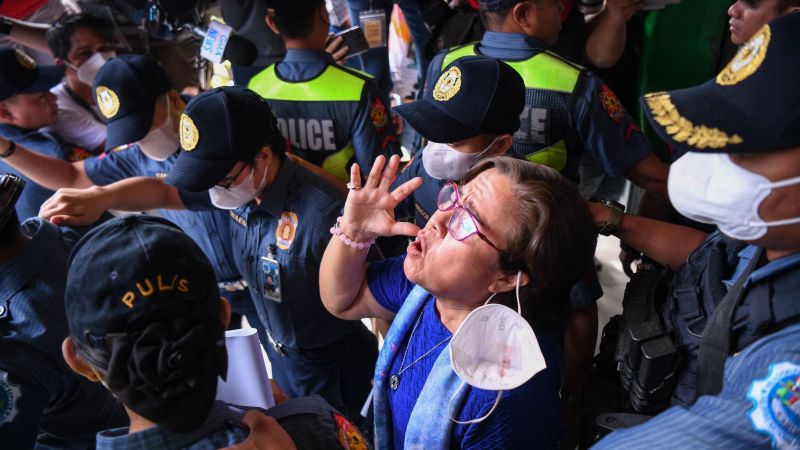 Philippine court dismisses drug charge against fierce critic of ex-president's 'war on drugs'