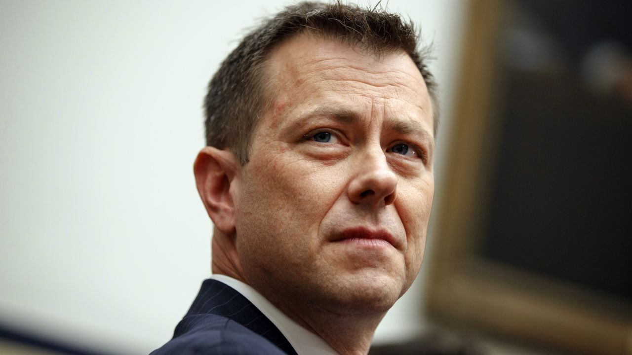 FILE - FBI Deputy Assistant Director Peter Strzok testifies before the House Committees on the Judiciary and Oversight and Government Reform during a hearing on Capitol Hill, July 12, 2018, in Washington. The Justice Department asked a judge Thursday, May 11, 2023, to put on hold a scheduled deposition of Donald Trump in a lawsuit brought by an FBI agent who was fired over text messages critical of the former president. The government said in a federal court filing that a judge should order lawyers for Peter Strzok to take the deposition of FBI Director Christopher Wray before they seek to question Trump. (AP Photo/Evan Vucci, File)