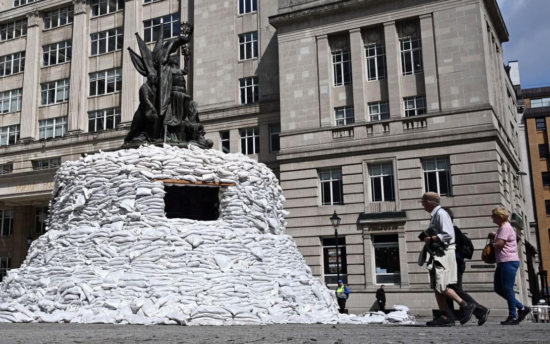 "Protect the Beats," an art installation by Ukranian musician Denys Kashchei, encased Nelson's monument in Liverpool with sandbags. 