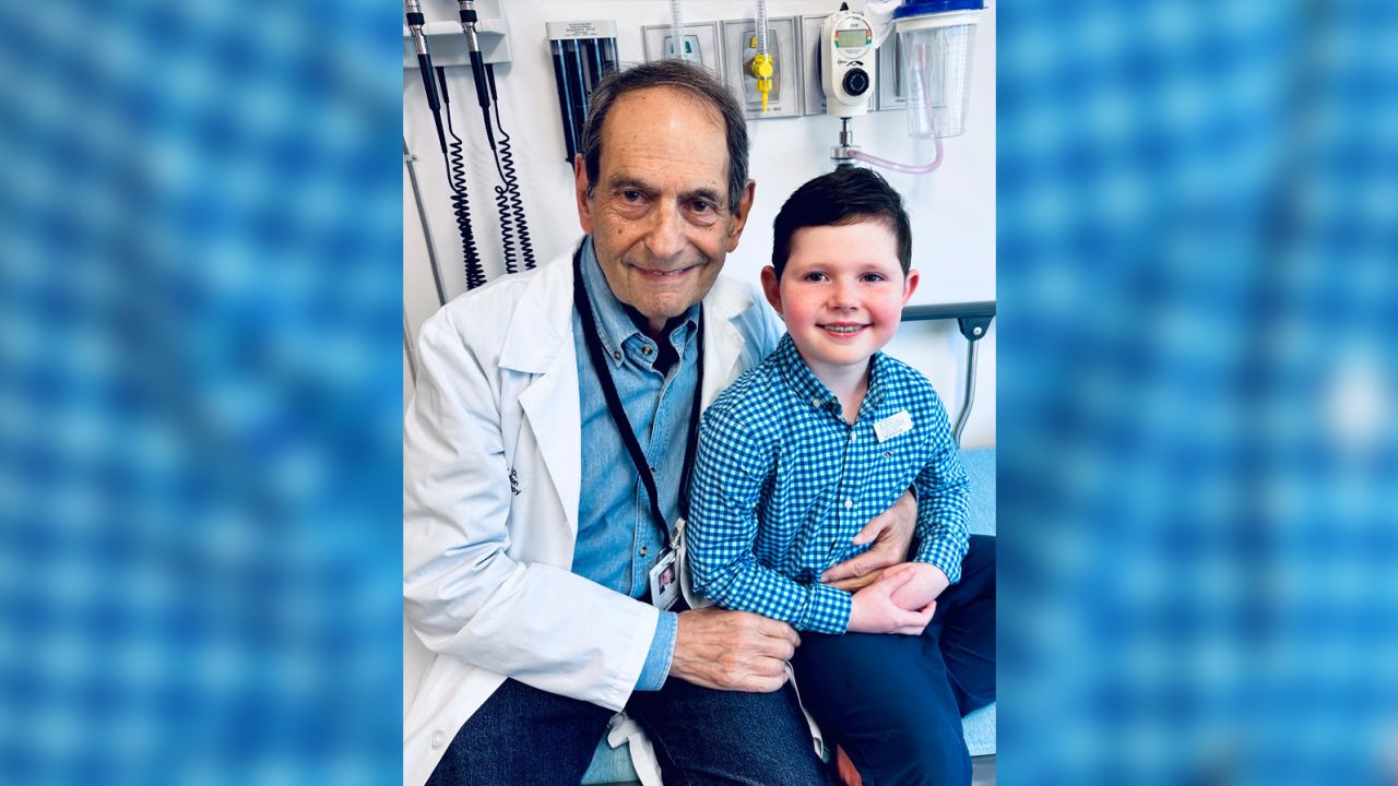 Dr. Jerry Mendell of Nationwide Children's Hospital in Ohio, who developed the gene therapy, left, with Brecken Kinney.