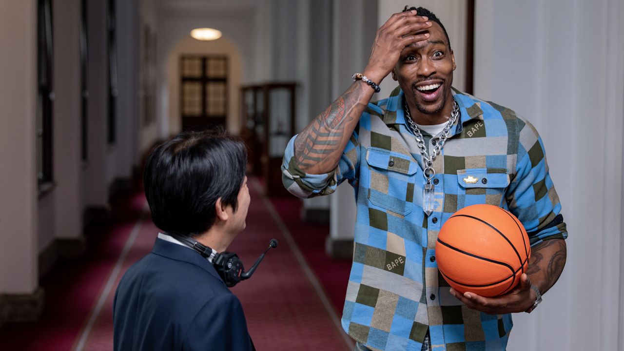 Former NBA star Dwight Howard shoots a promotional video for Taiwan with the democratic island's Vice President William Lai.