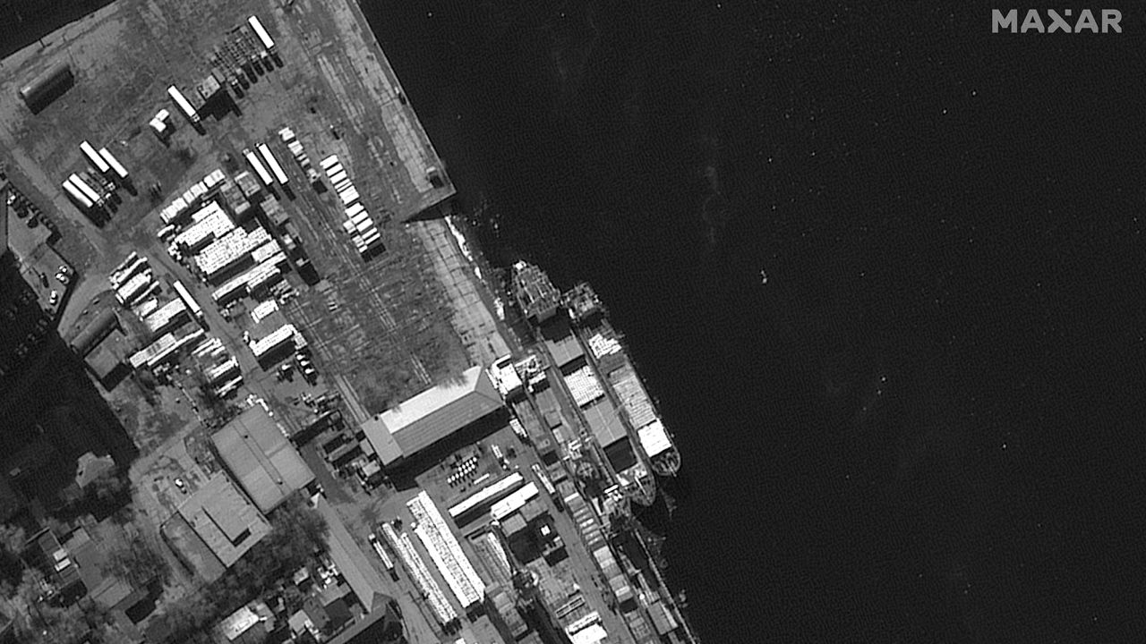 The Russian-flagged cargo ship (left) that experts say could be linked to the arms trade is seen in a satellite image of  Astrakhan Port in Russia taken on March 7.