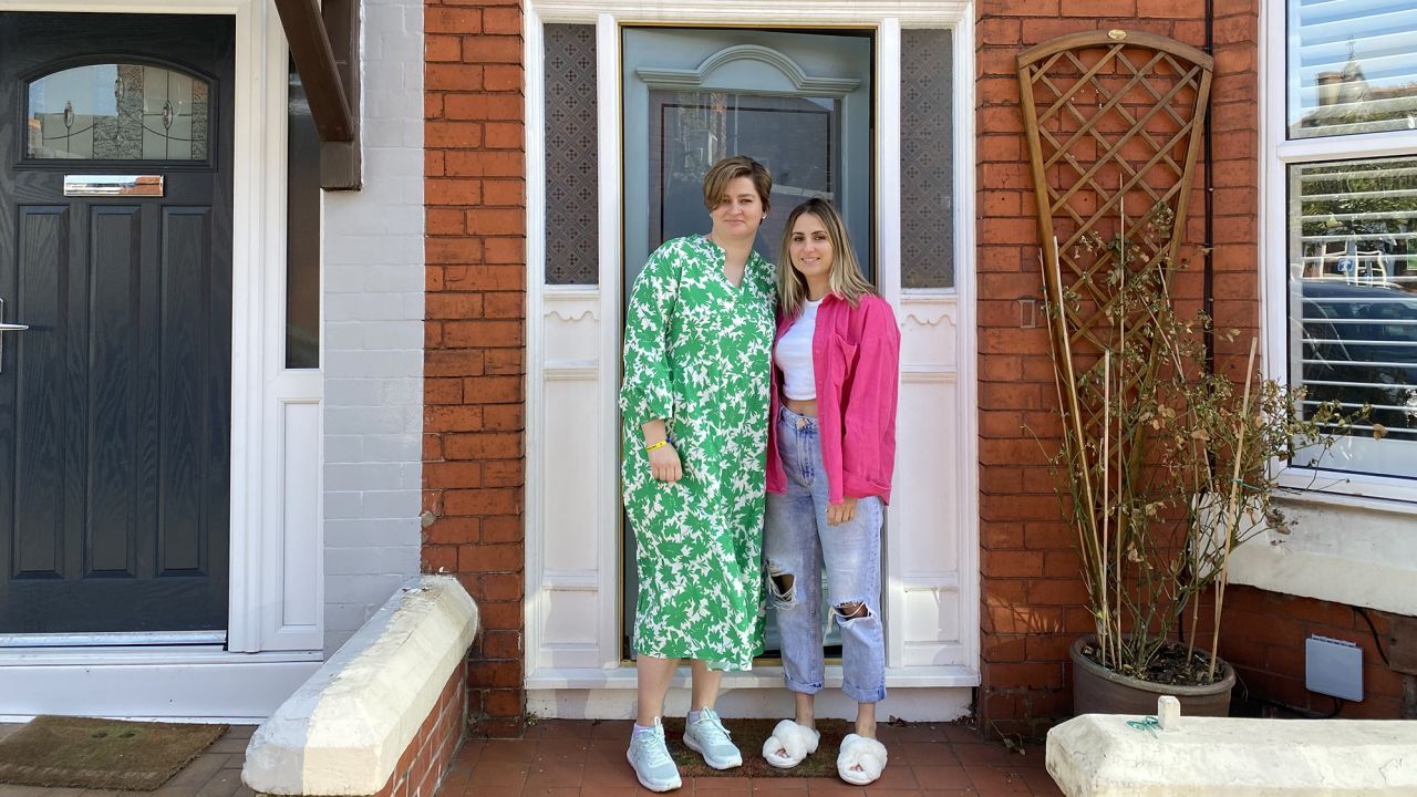 Iryna Shevchuk, left, outside the Liverpool home of her host, Amel Menacere.
