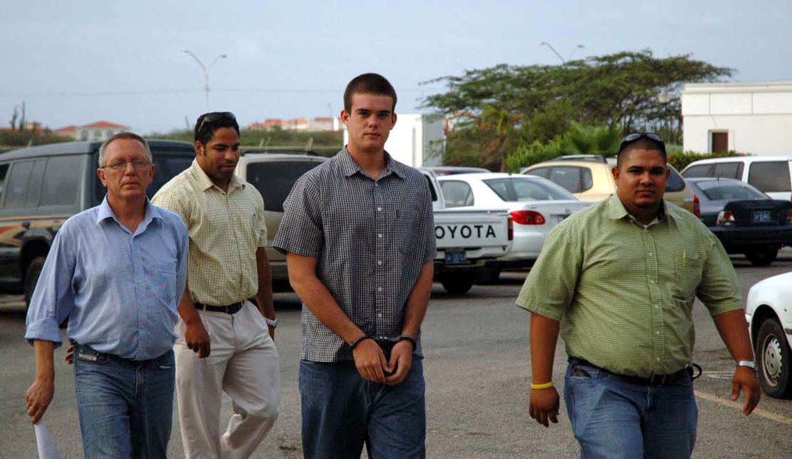 Joran van der Sloot, center, arrives for DNA testing on July 20, 2005, in Oranjestad, Aruba.