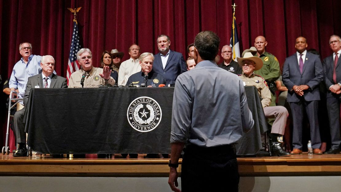 Texas Democratic gubernatorial candidate Beto O'Rourke disrupts a press conference held by Governor Greg Abbott the day after a gunman killed 19 children and two teachers at Robb Elementary School in Uvalde, Texas, U.S. May 25, 2022.
