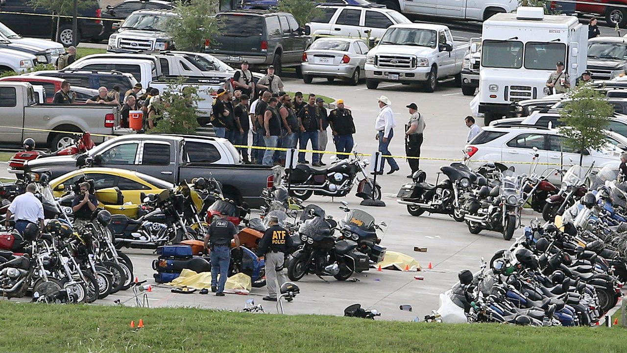 On May 17, 2015, authorities investigate a shooting in the parking lot of the Twin Peaks restaurant, in Waco, Texas.