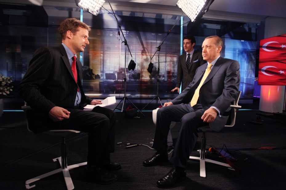 Erdogan prepares for a television interview in London in March 2011.