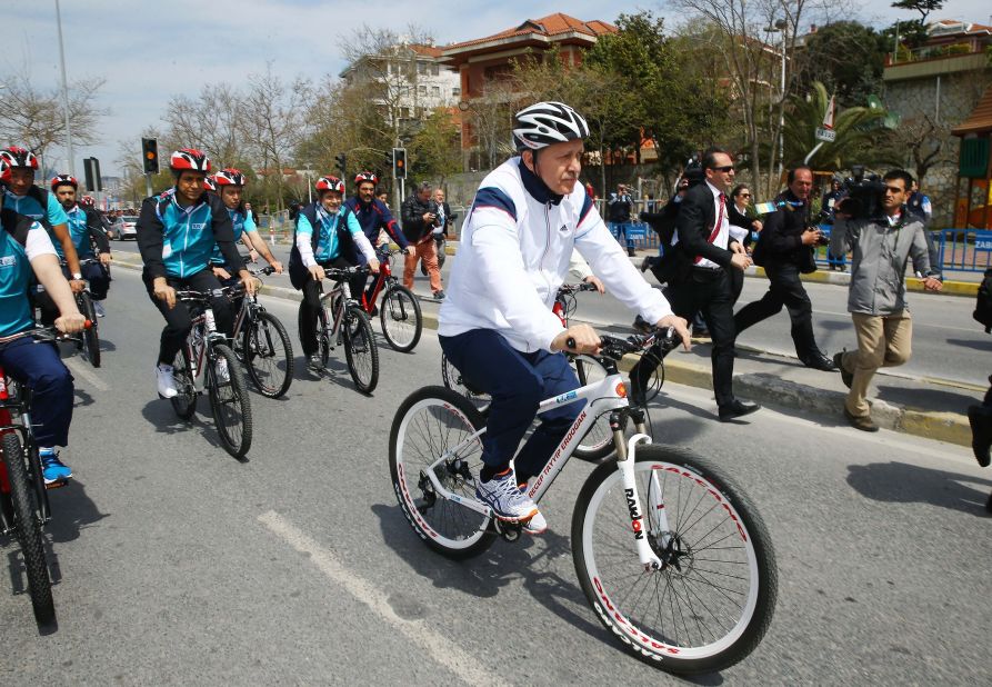Erdogan rides a bicycle during the launch of the 51st Presidential Cycling Tour of Turkey in April 2015.