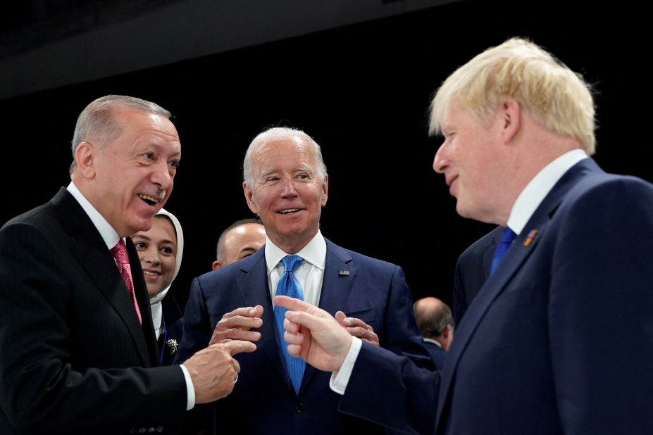 Erdogan talks with US President Joe Biden, center, and British Prime Minister Boris Johnson, right, at a NATO summit in Madrid in June 2022.