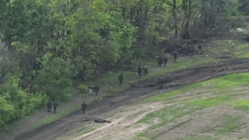 Russian soldiers retreat