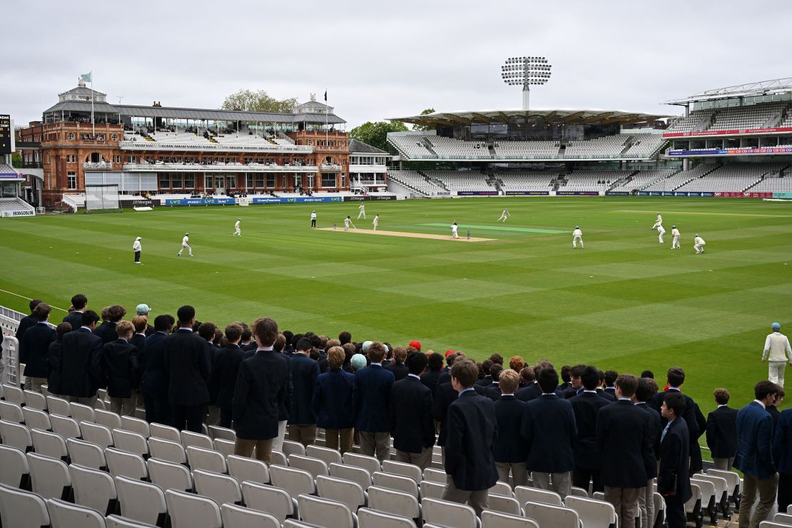 Schoolboys look on from the grandstand during the Eton vs. Harrow cricket match at Lord's on Friday.