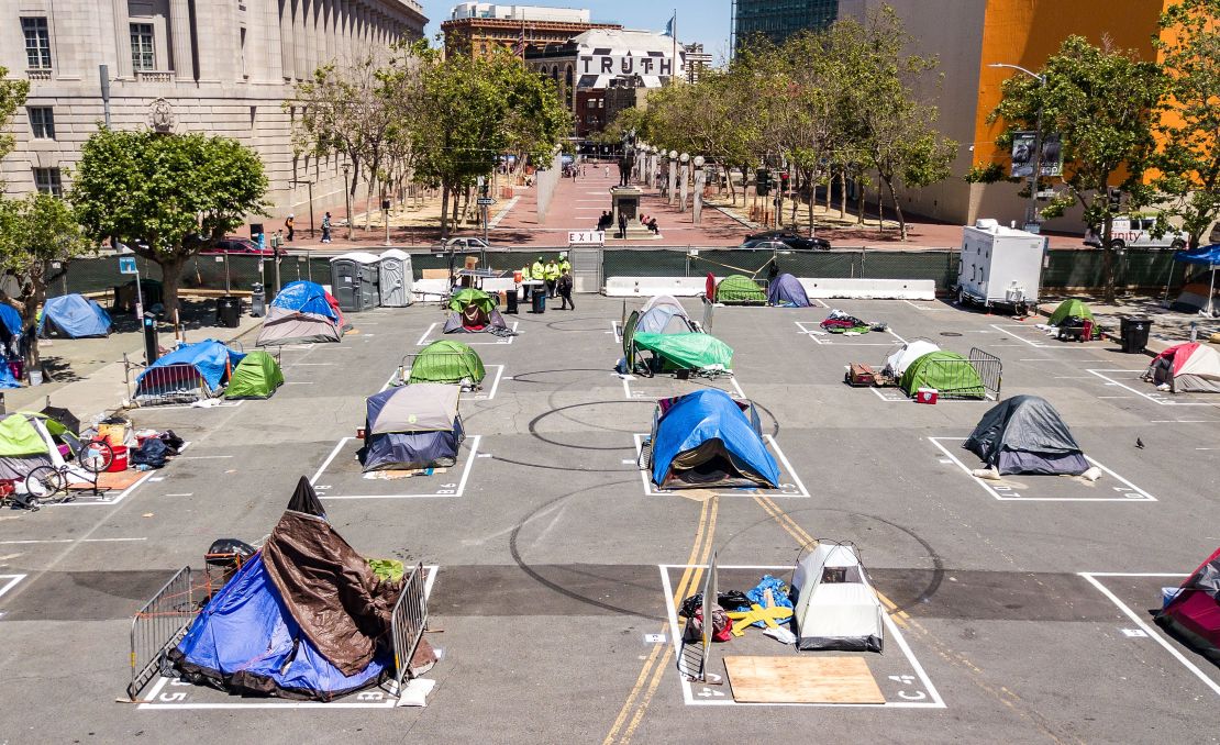 Rectangles are painted on the ground to encourage homeless people to keep social distancing at a city-sanctioned homeless encampment across from City Hall in San Francisco in May 2020.