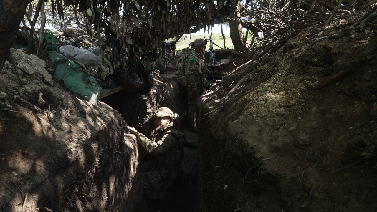 Ukrainian soldiers with the 3rd Assault Brigade manning a trench 600 yards from Russian soldiers on the outskirts of Bahkmut. 