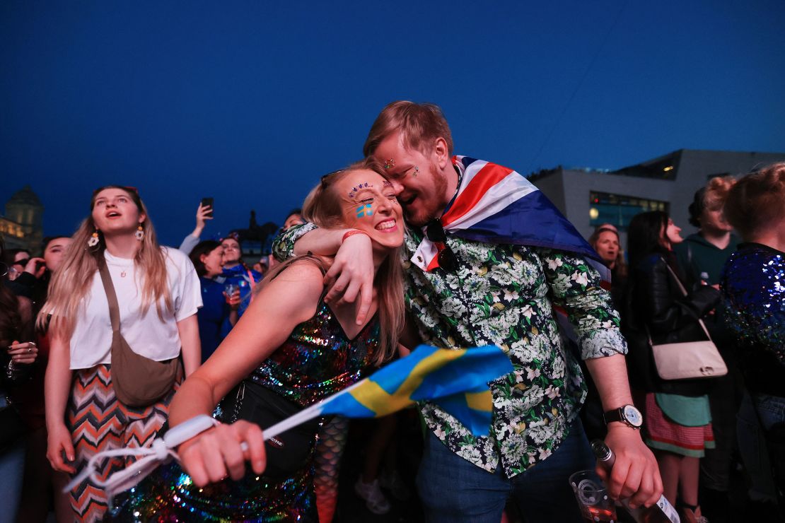 Eurovision fans enjoy the party atmosphere as they gather in Liverpool to watch the Eurovision Song Contest final.