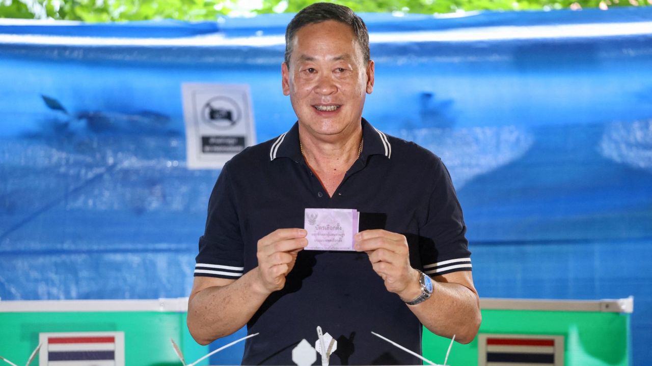 Pheu Thai prime ministerial candidate Srettha Thavisin casts his ballot at a polling station in Bangkok on May 14, 2023.
