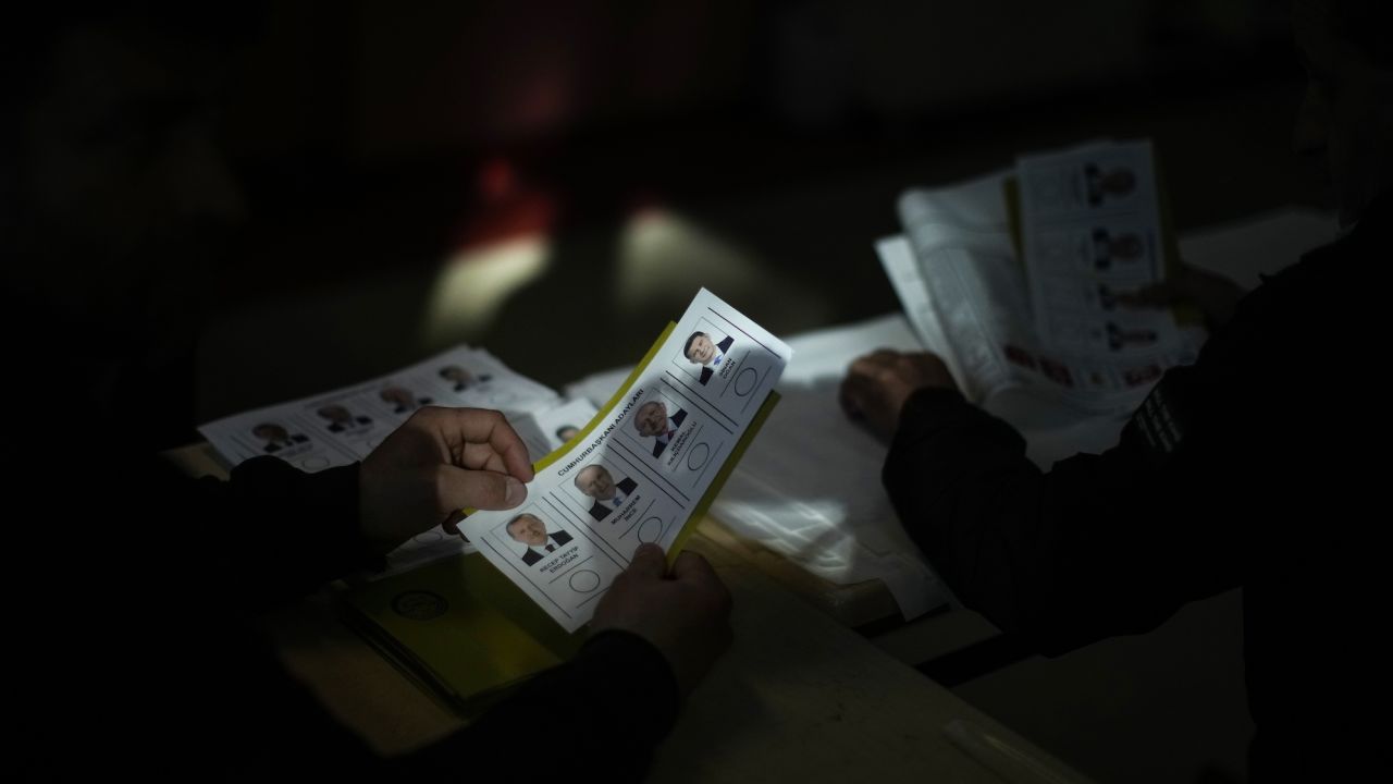 Election representative prepare the ballots at a polling station at a polling station in Istanbul.