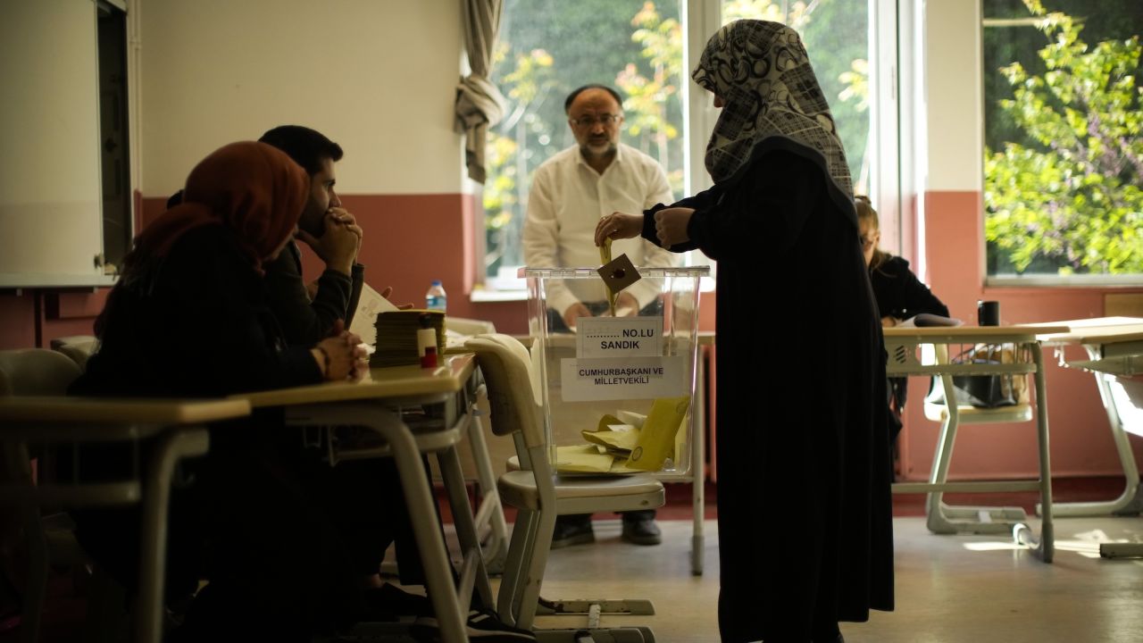 A woman votes at a polling station in Istanbul.