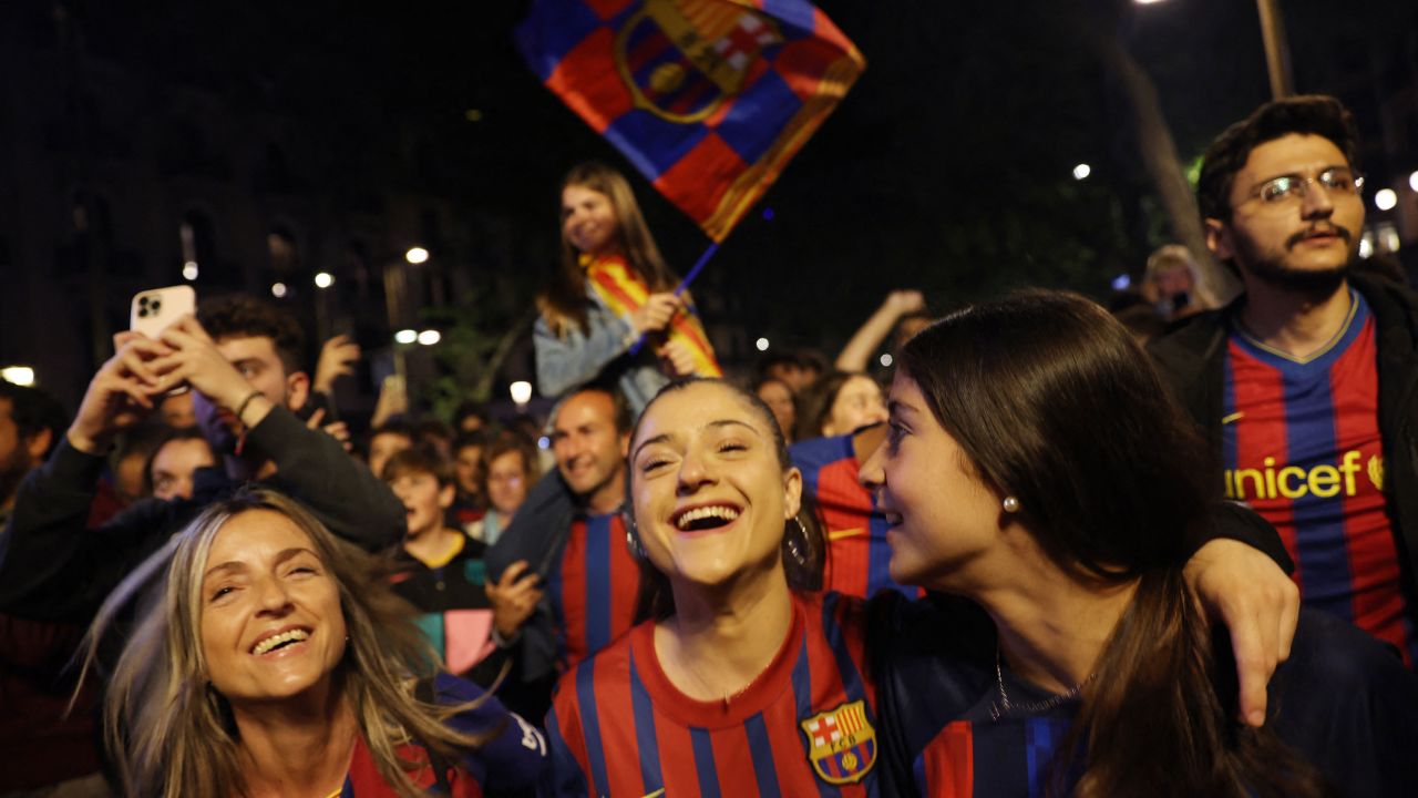 Barcelona fans celebrate Sunday's La Liga success -- the club's first league title since the 2018-19 season. 