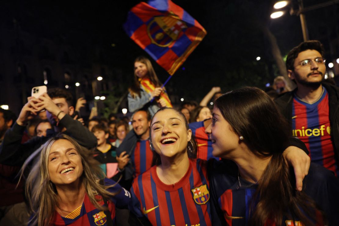 Barcelona fans celebrate Sunday's La Liga success -- the club's first league title since the 2018-19 season. 