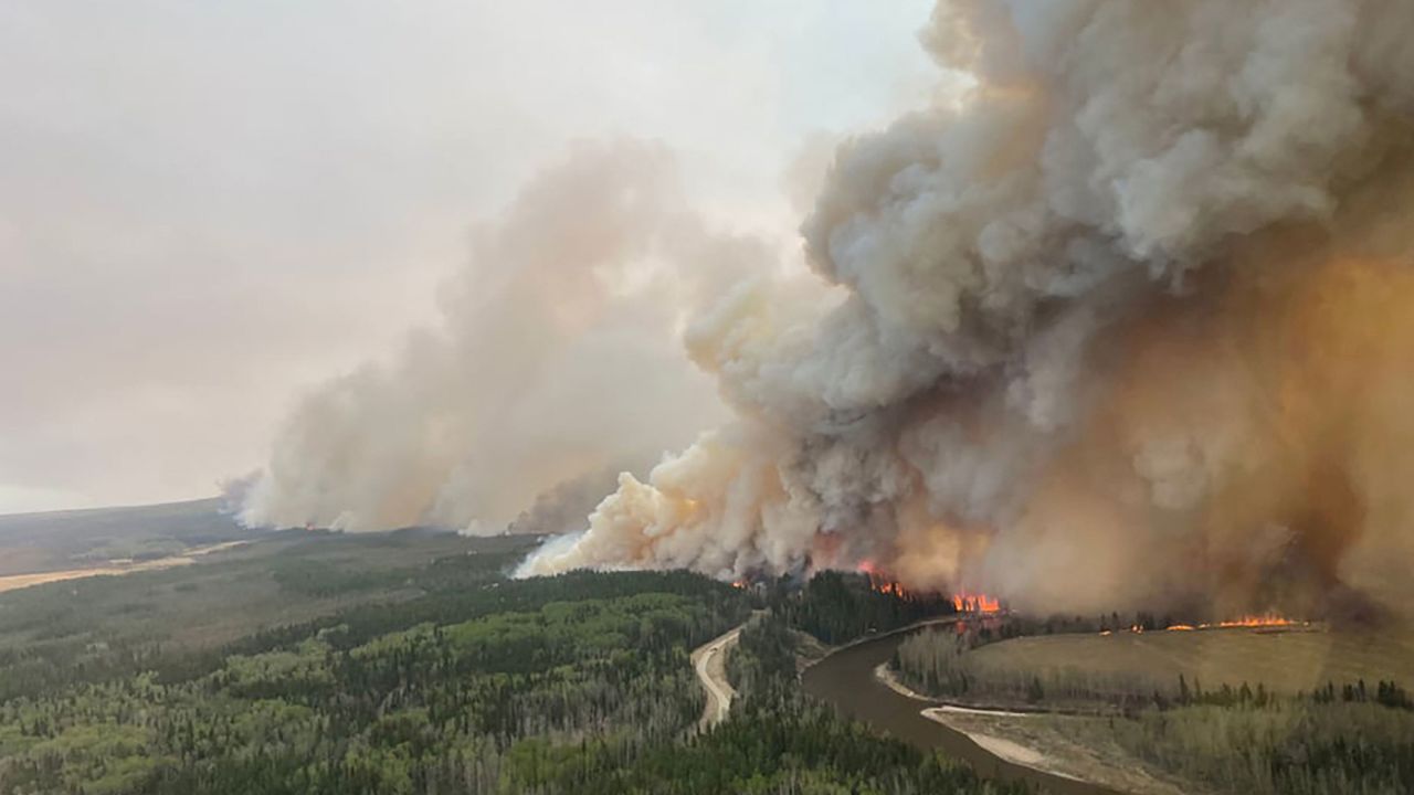 A smoke column rises from wildfire EWF-035 near Shining Bank, Alberta, Canada May 5, 2023.