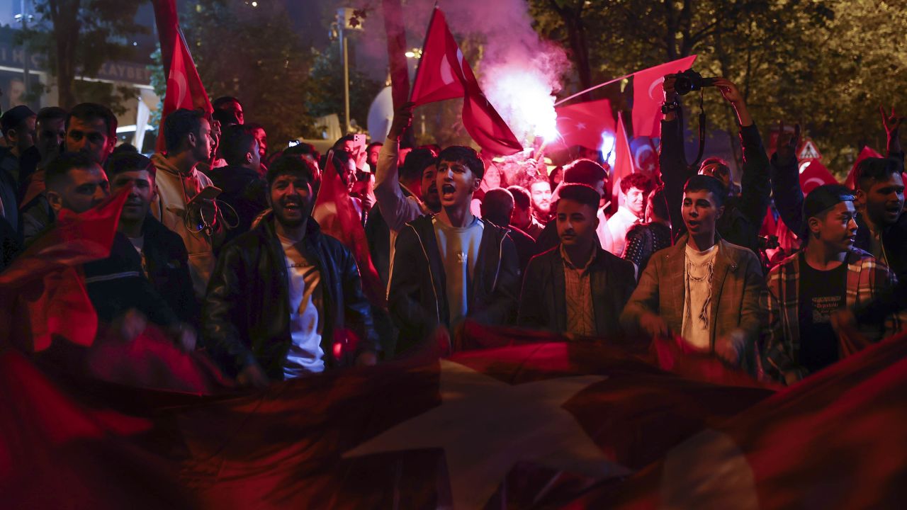 Supporters of Turkish President Recep Tayyip Erdogan celebrate at the AK Party headquarters on May 14, 2023 in Istanbul, Turkey. Photo by Jeff J Mitchell/Getty Images.