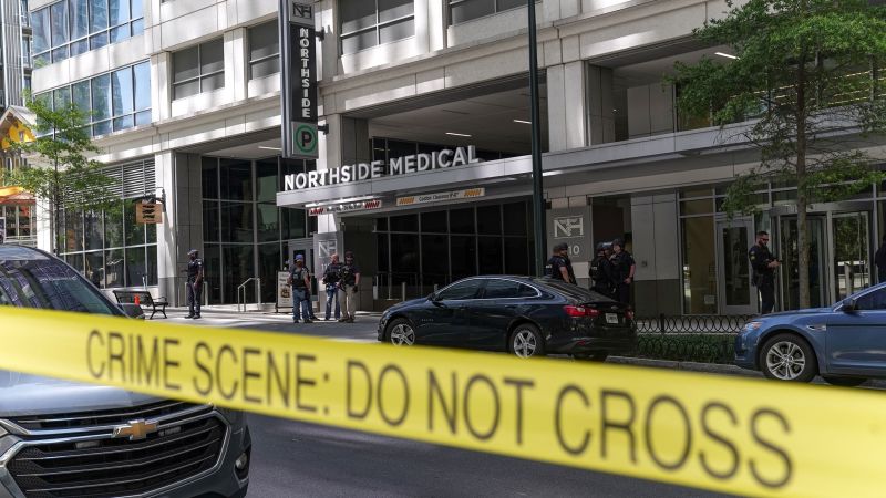 NextImg:More hospitals turn to police forces to keep health care workers safe, but there are downsides to that | CNN