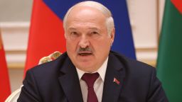 Belarusian President Alexander Lukashenko speaks with Russian counterpart at the Palace of Independence, December 19, 2022, in Minsk, Belarus. 