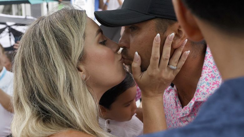 MCKINNEY, TEXAS - MAY 14: Jason Day of Australia and wife Ellie Day celebrate after Day finished his round during the final round of the AT&T Byron Nelson at TPC Craig Ranch on May 14, 2023 in McKinney, Texas. (Photo by Mike Mulholland/Getty Images)
