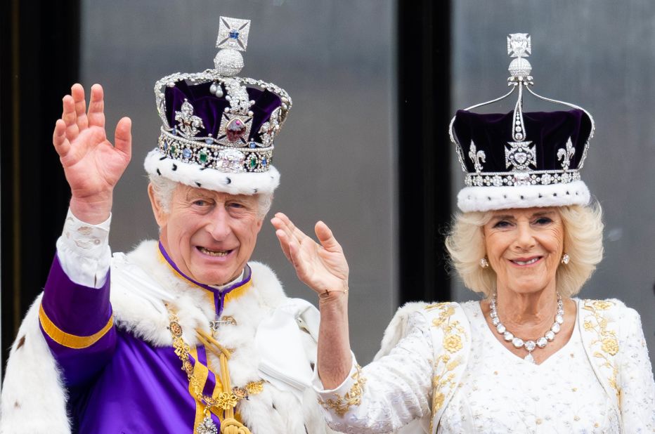 Britain's King Charles III and Queen Camilla wave from the balcony of Buckingham Palace after their <a href="http://www.cnn.com/2023/05/06/uk/gallery/coronation-king-charles/index.html" target="_blank">coronation ceremony</a> in May 2023.