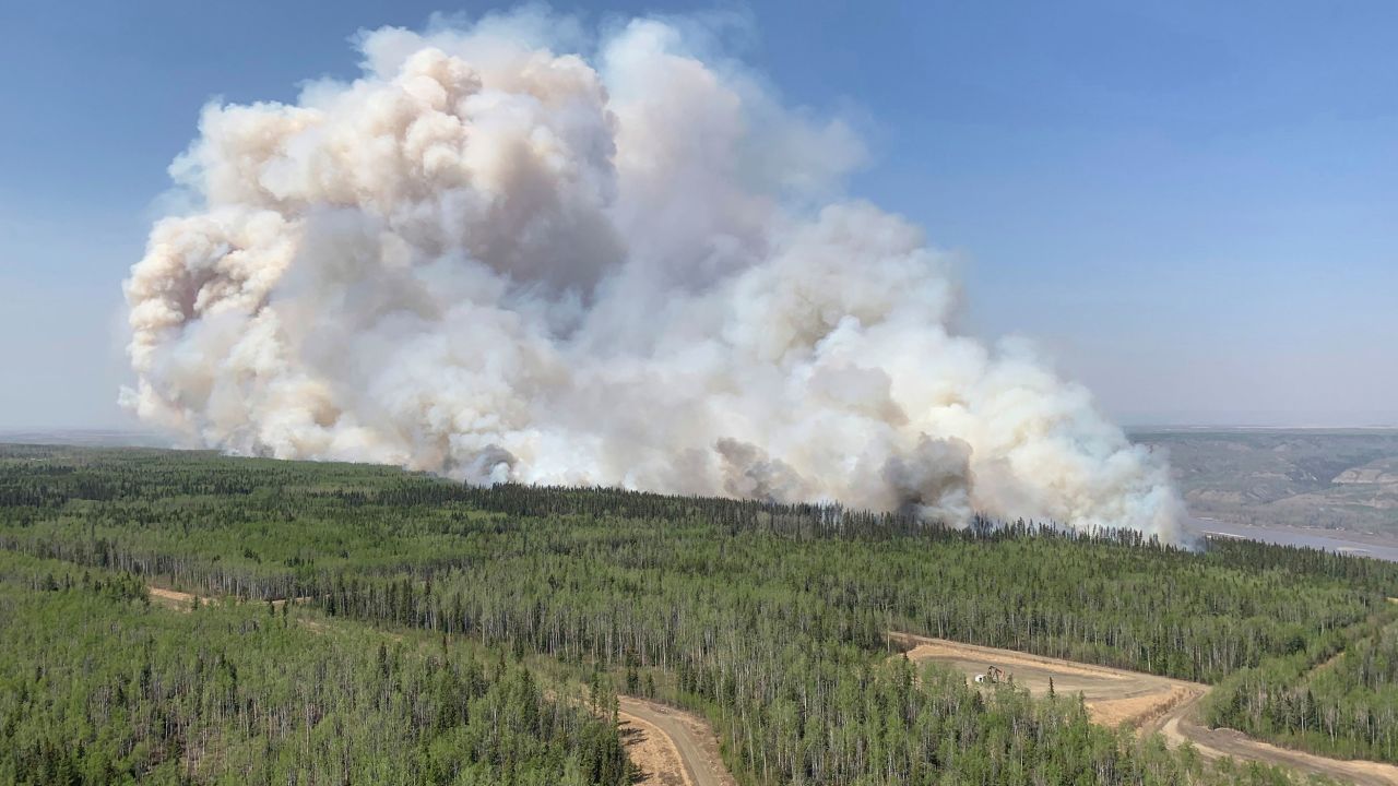 A wildfire burns a section of forest in the Grande Prairie district of Alberta, Canada, Saturday, May 6, 2023. 