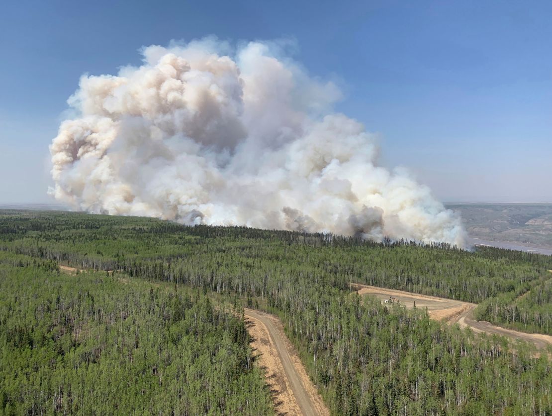 A wildfire burns a section of forest in the Grande Prairie district of Alberta, Canada, Saturday, May 6, 2023. 
