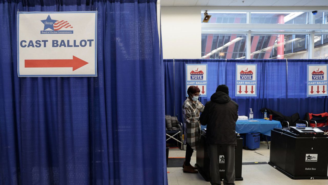 Voters cast their vote as early voting begins on March 20, 2023, for Chicago's runoff election at the Chicago Board of Elections Loop Supersite.