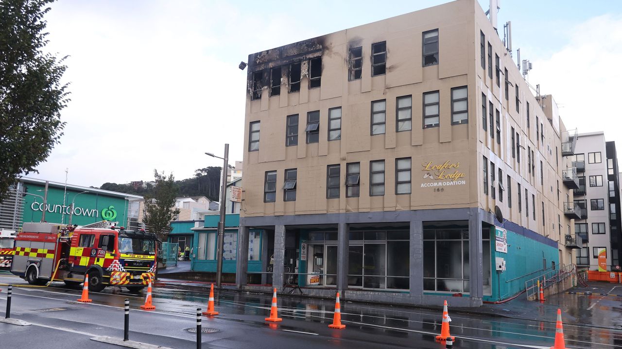 Damage is seen on the Loafers Lodge hostel building following a fatal fire in Wellington on May 16, 2023. At least six people have been killed in a fire that erupted in the early hours of Tuesday in a four-storey hostel in Wellington, capital city of New Zealand. (Photo by Marty MELVILLE / AFP) (Photo by MARTY MELVILLE/AFP via Getty Images)