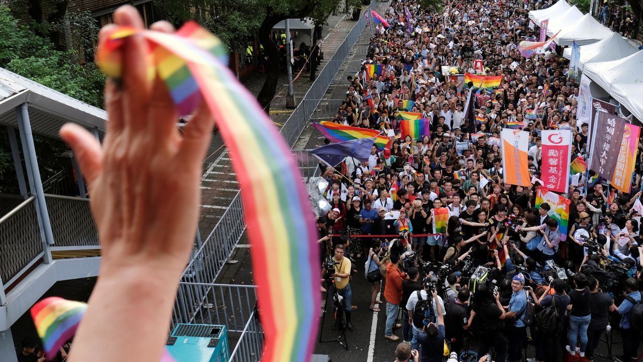 Same-sex marriage supporters celebrate in Taipei after Taiwan became the first place in Asia to legalize same-sex marriage on May 17, 2019.