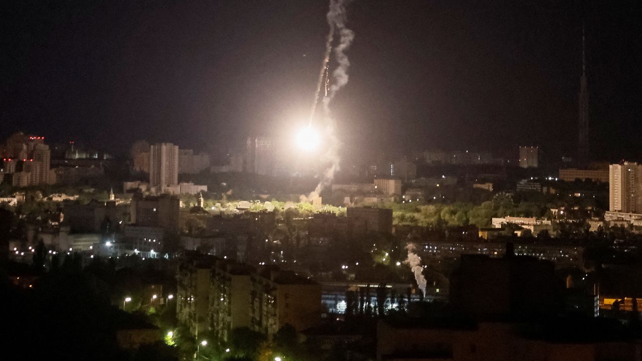 An exploded missile streaks across the sky over Kyiv amid Russia's war on Ukraine on May 16, 2023. The Kremlin claimed it had hit a US Patriot missile defense system.