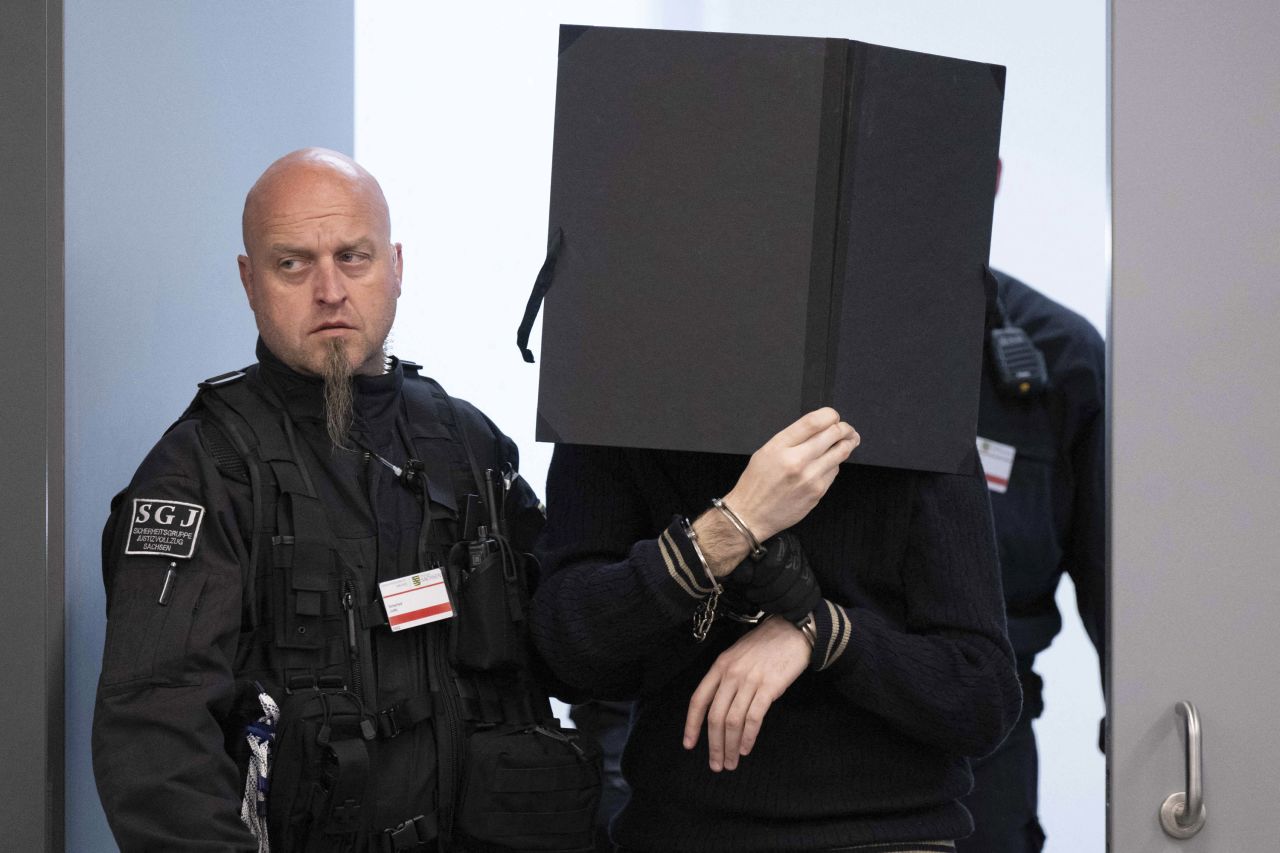 A defendant is brought to the courtroom on May 16, 2023 in Dresden, before the verdict was announced.
