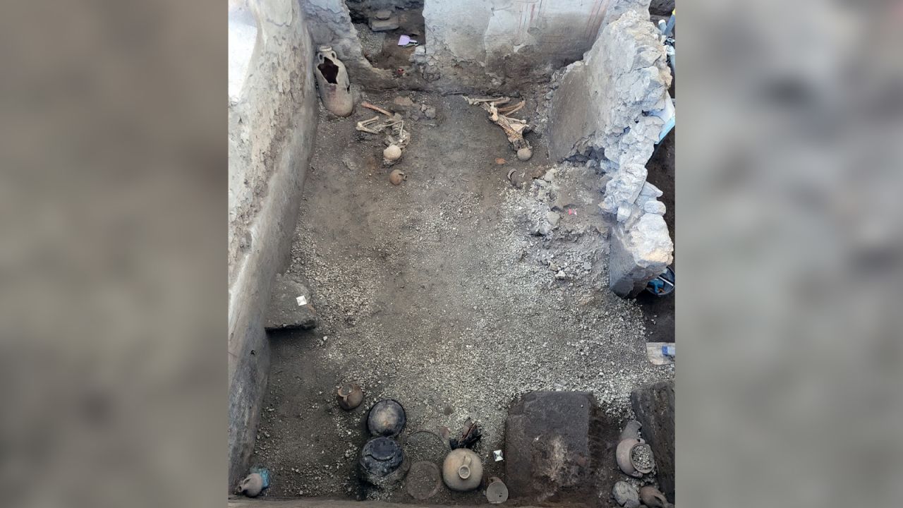 The two were found lying in a utility room, experts say.