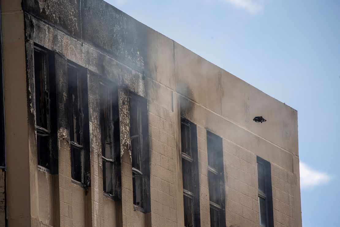 A drone inspects damage following the fire at the four-story hostel in central Wellington, New Zealand. 