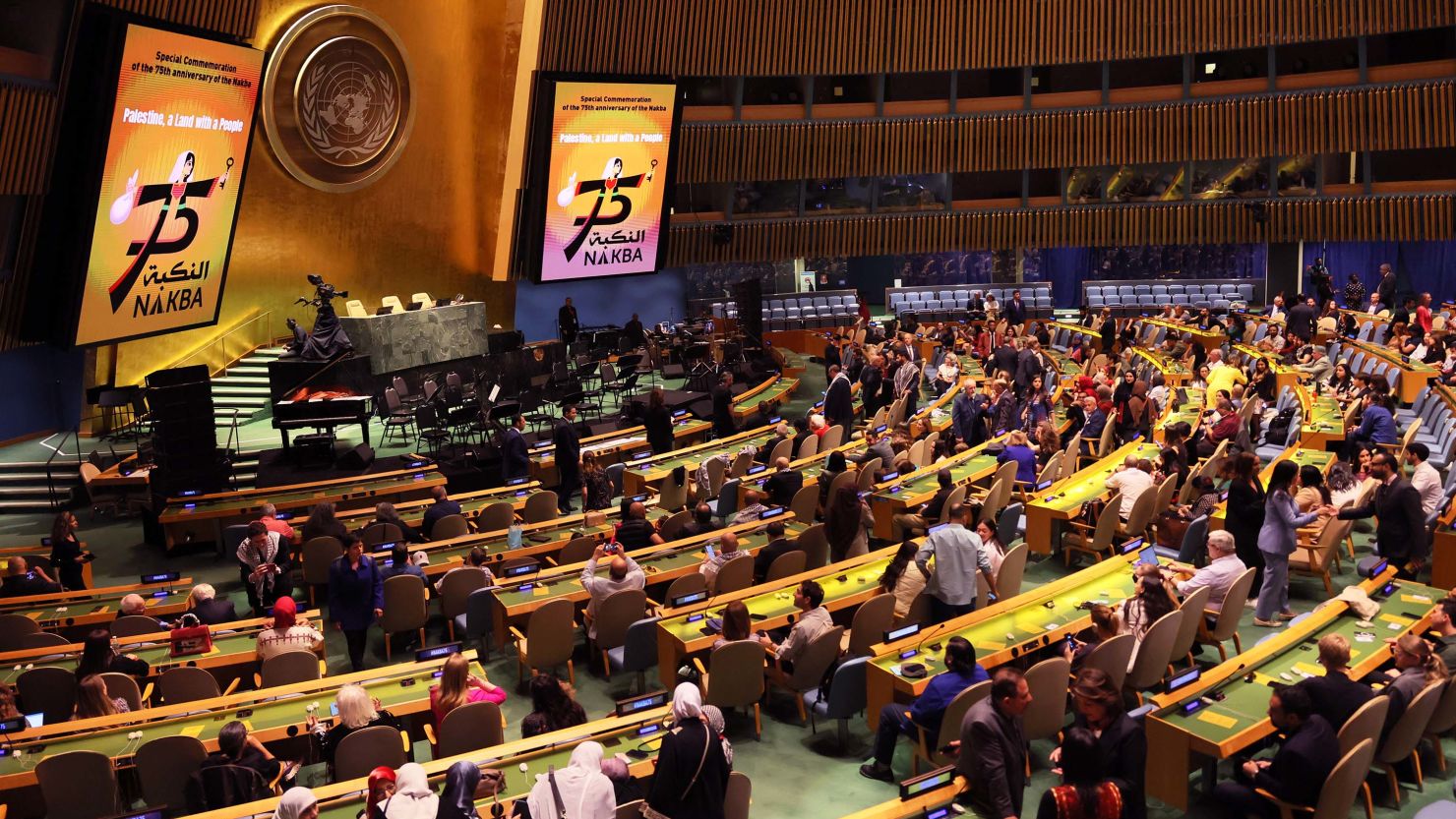 People attend an observation of the 75th anniversary of the Nakba in the General Assembly Hall at the United Nations on Monday in New York City. 