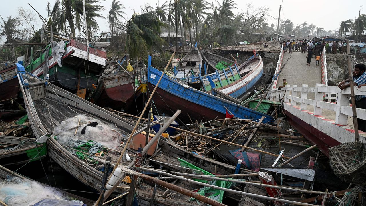 Smashed-up boats are piled up next to a broken bridge in Sittwe, in Myanmar's Rakhine state, on May 15 after Cyclone Mocha. 