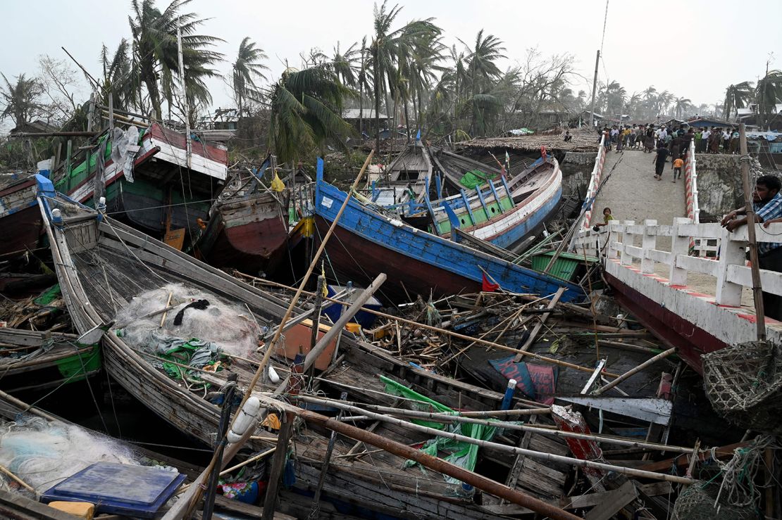 Smashed-up boats are piled up next to a broken bridge in Sittwe, in Myanmar's Rakhine state, on May 15 after Cyclone Mocha. 