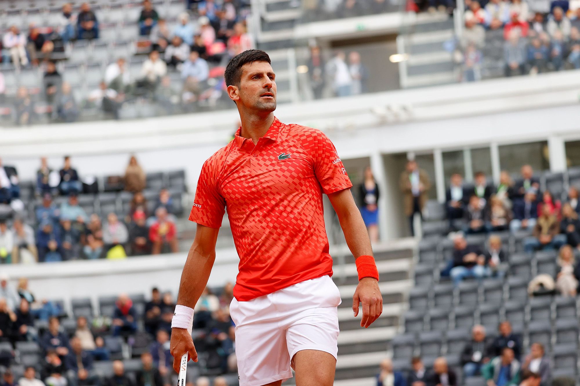 Holger Rune beats Novak Djokovic in rainy Italian Open