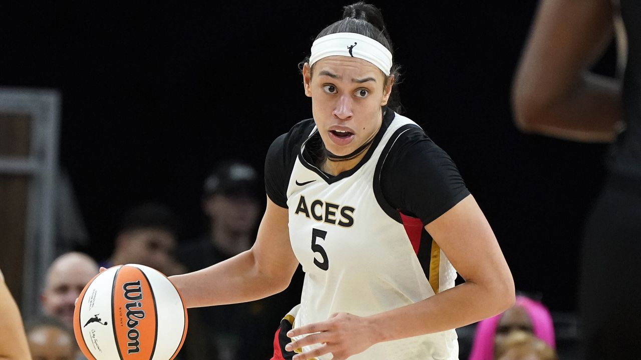 Dearica Hamby (5) dribbles up court for the Aces during a WNBA basketball game against the Phoenix Mercury, on May 6, 2022, in Phoenix. 