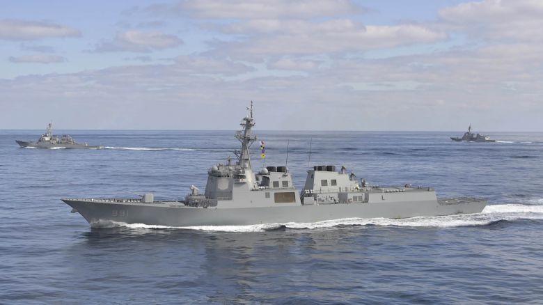 In this photo provided by South Korea Defense Ministry, South Korean Navy's Aegis destroyer King Sejong the Great, front, sails with U.S. Navy's Arleigh Burke-class guided-missile destroyer USS Barry, left, and Japan Maritime Self-Defense Force's destroyer Atago, right, during a joint missile defense drill between South Korea, the United States and Japan in the international waters of the east coast of Korean peninsular, Wednesday, Feb. 22, 2023. (South Korea Defense Ministry via AP)
