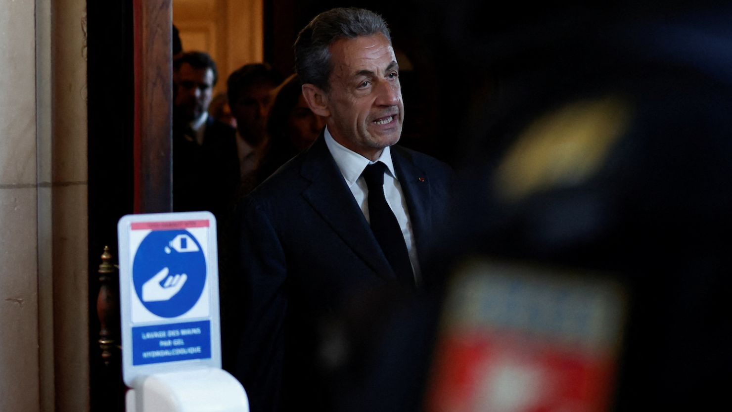 Nicolas Sarkozy leaves the Paris Court of Appeals in Paris after hearing the ruling on May 17, 2023.  